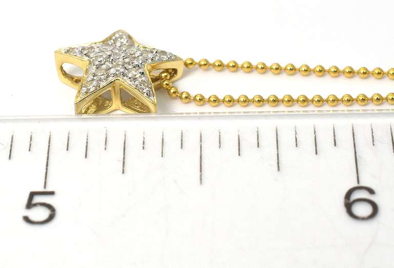Sparkling Diamond Star Pendant and Chain in 14KT Yellow Gold