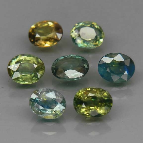 Radiant 3.37ct oval cut 7pc Sapphire set