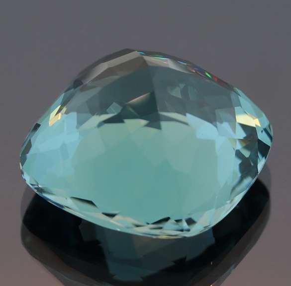 Radiant 34.75ct blue green created Amethyst