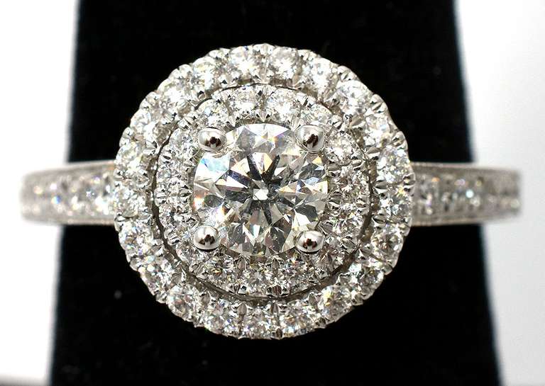 Stunning 1.00CTW Diamond Halo Ring in 14KT White Gold