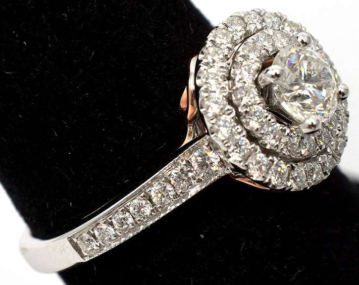 Stunning 1.00CTW Diamond Halo Ring in 14KT White Gold