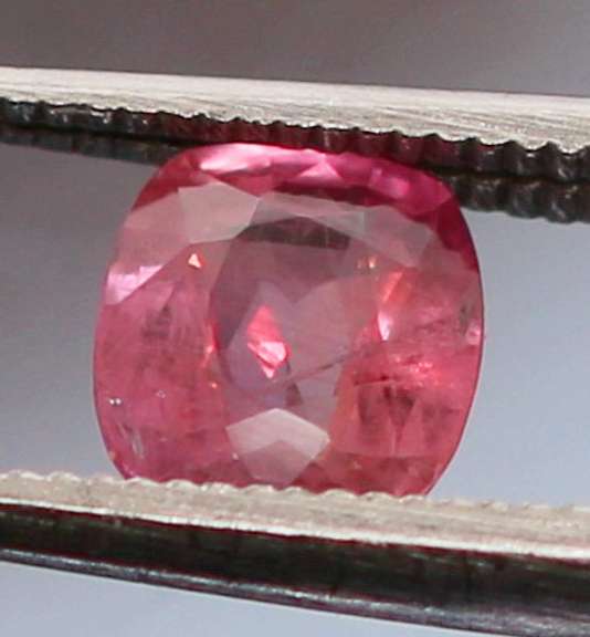 High quality .65ct cushion cut Ruby solitaire