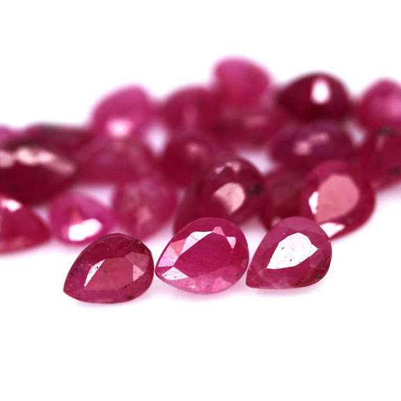 Heated only! 9.83ct violet red Ruby set