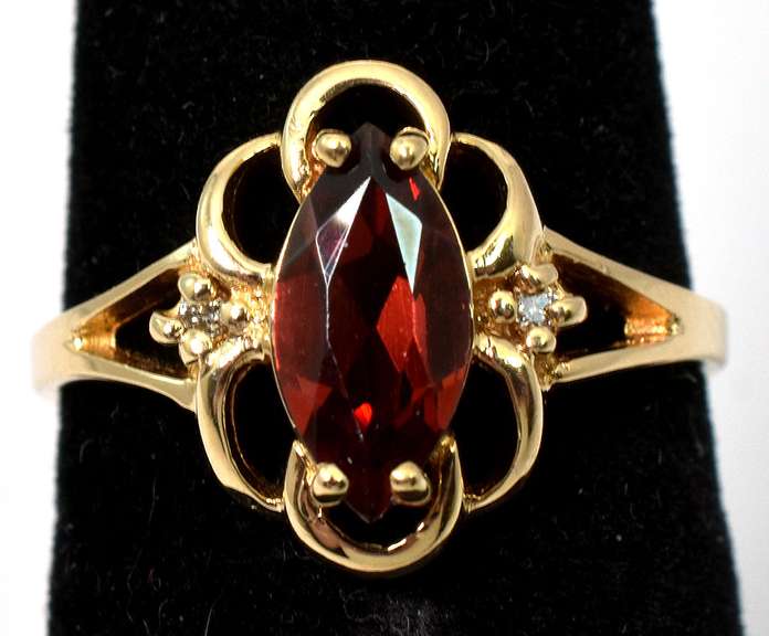 Filigree Garnet Ring with Diamond Accents in Yellow Gold