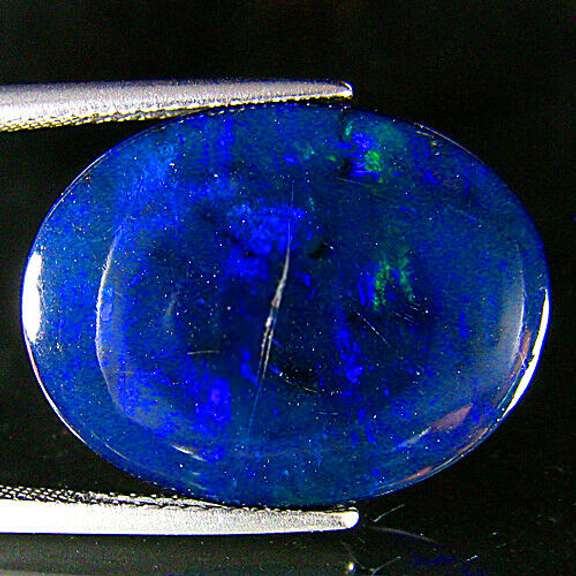 Mesmerizing! 8.76ct rare blue flashing Black Opal
