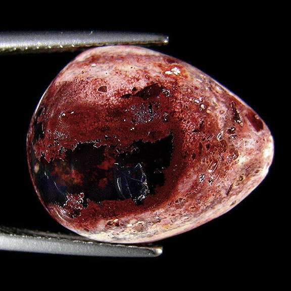 Striking 9.54ct blood red Mexican matrix Opal