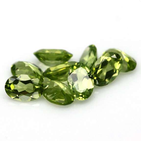 Dazzling 4.10ct untreated lime green Peridot set
