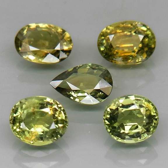 Radiant 4.24ct mixed cut 5pc Sapphire set