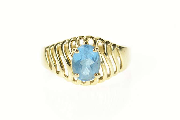14K Yellow Gold Oval Blue Topaz Wavy Pattern Statement Ring