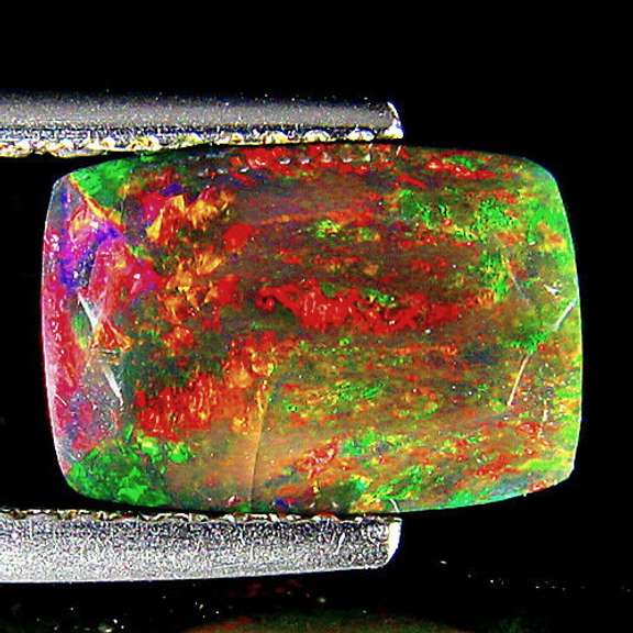 Captivating 2.07ct floral and fairy fire black Opal