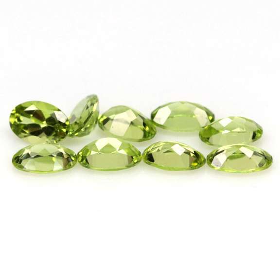 Dazzling 3.99ct untreated lime green Peridot set