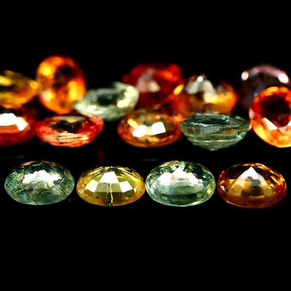 Heated only! Vibrant 7.89ct fancy color Sapphire set