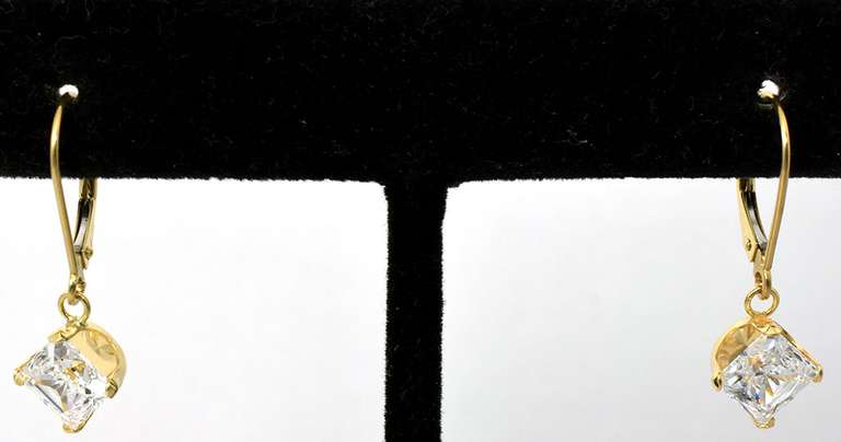 Eye-Catching CZ earrings in 14KT Yellow Gold