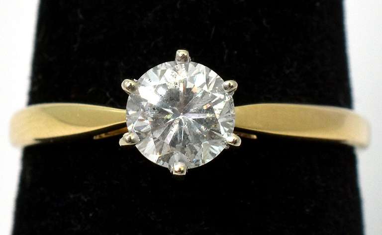 Alluring 2/3CT Diamond Solitaire Ring in 14KT Yellow Gold