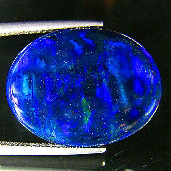 Mesmerizing! 8.76ct rare blue flashing Black Opal