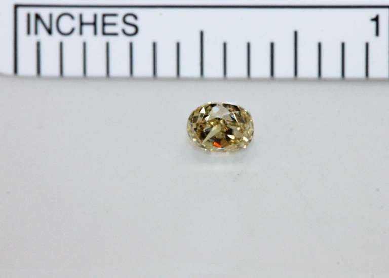 Winking Natural Yellow Diamond - 0.38 ct.