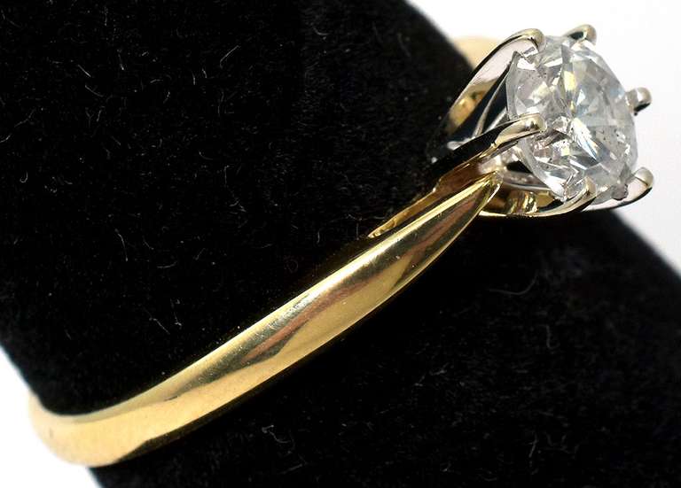 Alluring 2/3CT Diamond Solitaire Ring in 14KT Yellow Gold