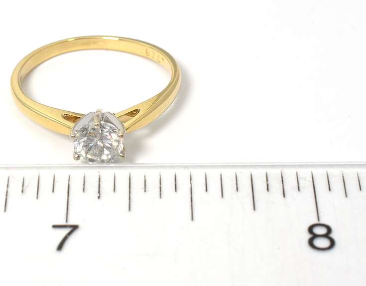 Alluring 2/3CT Diamond Solitaire Ring in 14KT Yellow Gold