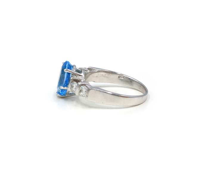 Lovely White Gold Blue Topaz and Diamond Ring