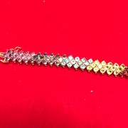 Ladies 14k gold bracelet with multi color gem stones