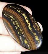 Dramatic 95ct Tiger Eye cabochon
