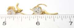 Eye-Catching CZ earrings in 14KT Yellow Gold