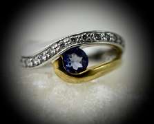 Stunning 18K Tanzanite and Diamond Ring