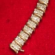 LADIES 14K GOLD AND DIAMOND BRACELET