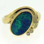 Formal 18kt Boulder Opal and Diamond Ring