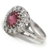 Tasteful White Gold Salmon Spinel & Diamond Halo Ring