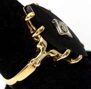 Mysterious Onyx & Diamond Accent Ring in Yellow Gold