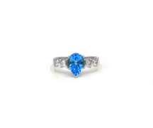 Lovely White Gold Blue Topaz and Diamond Ring