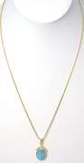 Enchanting Opal Pendant with Diamonds in 14 KT Yellow Gold