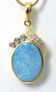 Enchanting Opal Pendant with Diamonds in 14 KT Yellow Gold