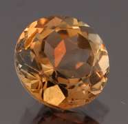 Exciting 3.47ct 9mm Imperial Topaz solitaire