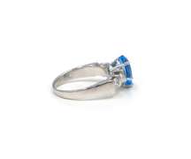 Lovely White Gold Blue Topaz and Diamond Ring