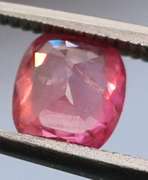 High quality .65ct cushion cut Ruby solitaire