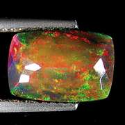 Captivating 2.07ct floral and fairy fire black Opal