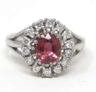 Tasteful White Gold Salmon Spinel & Diamond Halo Ring