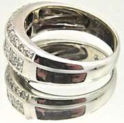 LADIES 14 KT WHITE GOLD DIAMOND BAND BY LEVIAN.