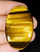 Full body shimmer! 80.54ct Golden Tiger Eye cabochon