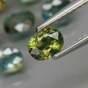 Radiant 3.37ct oval cut 7pc Sapphire set