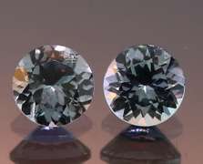 Glittering 1.49ct pair of silvery blue Tanzanite