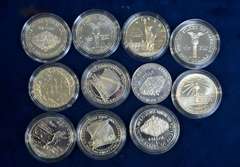 Lot of 11 Commemorative Silver Dollars