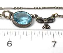 Sweet Blue Topaz & Bow Bracelet in Sterling Silver