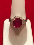 14K Ruby Split Shank Ring with Diamond Halo