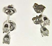 LADIES 14 KT WHITE GOLD DIAMOND STUDS.