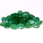 Rich green unheated 8.14ct 5x4mm Emerald set
