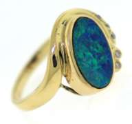 Formal 18kt Boulder Opal and Diamond Ring