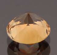 Exciting 3.47ct 9mm Imperial Topaz solitaire